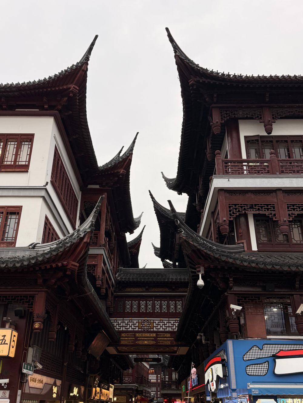 Layered eaves and timber windows in the Yuyuan area, Shanghai